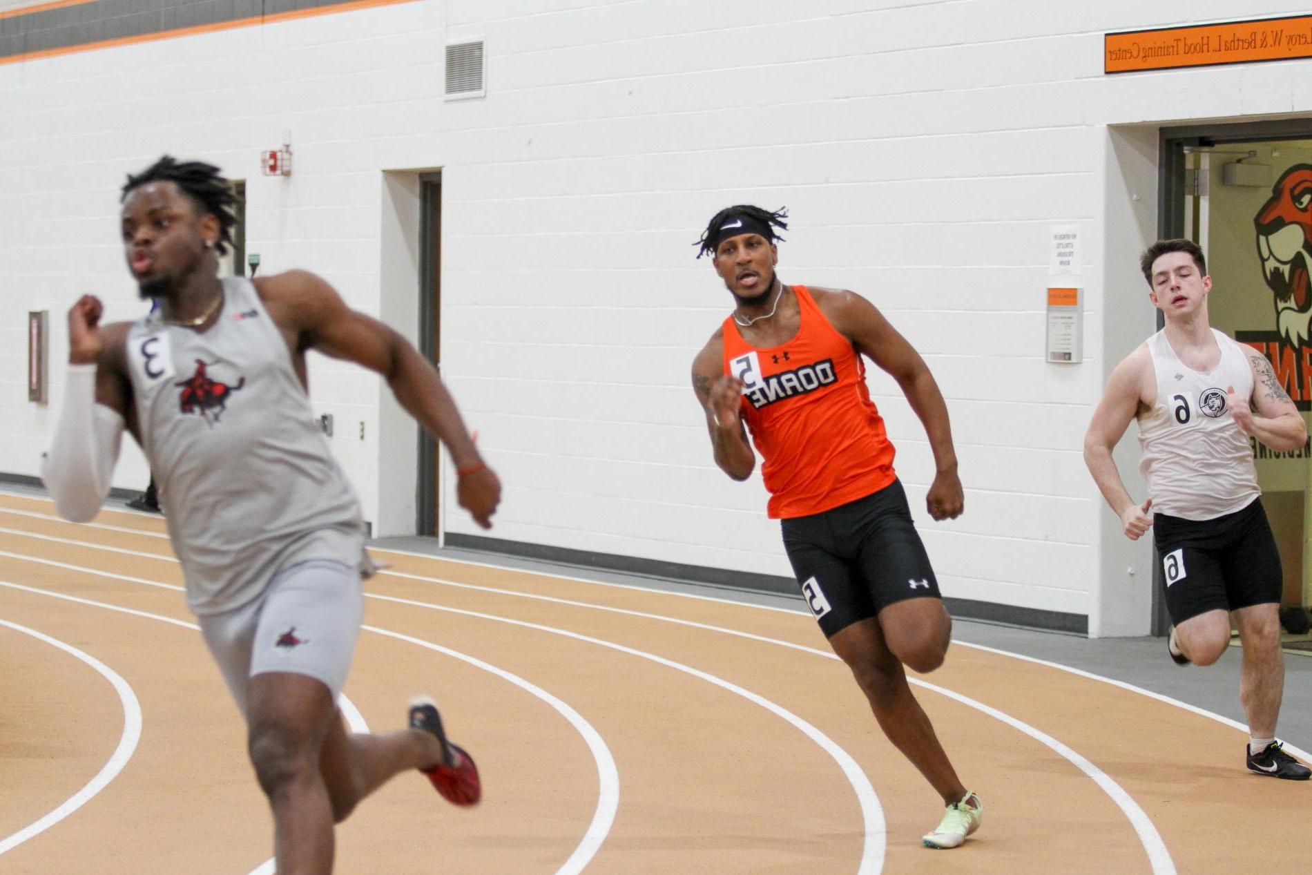 Myles Wheatley runs on the indoor track