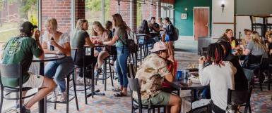 Students socializing in Perry Campus Center